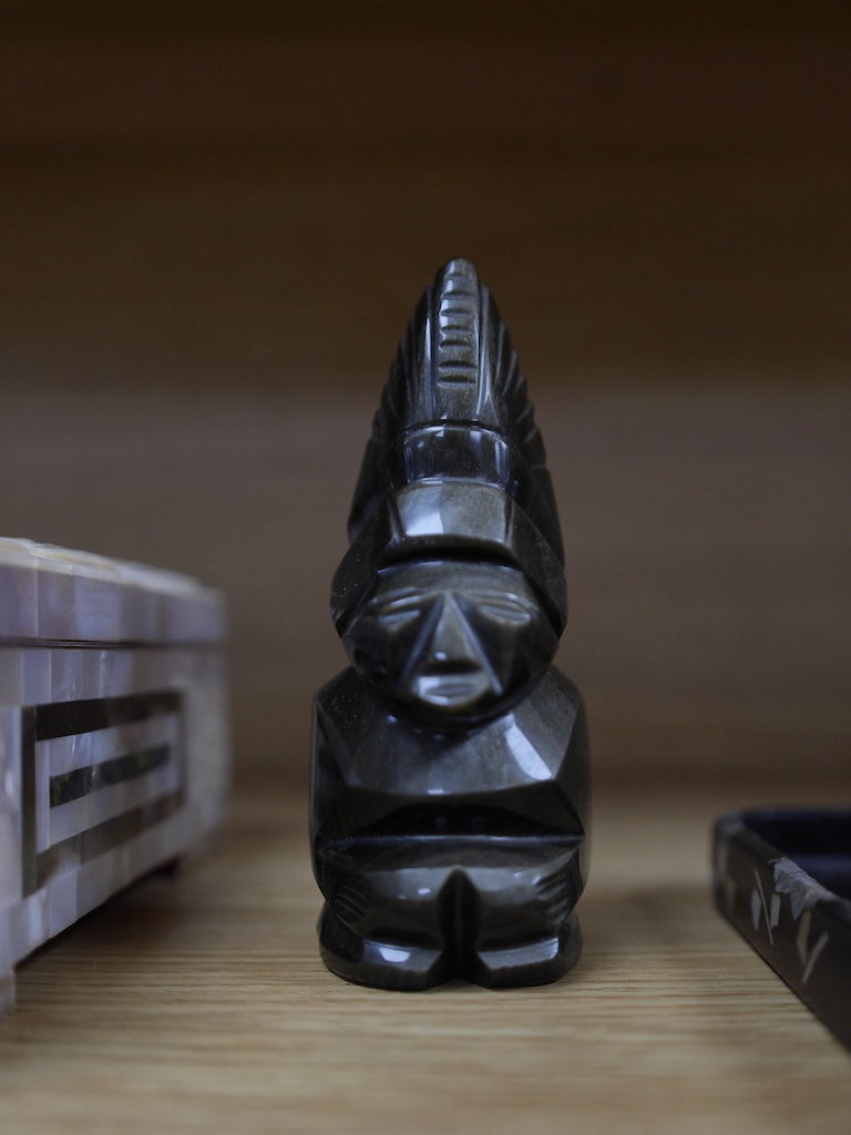 Sundry items comprising a pearl box, a papier mache tray, an inuit type carving and a papier mache box, 28cm wide. Condition - Varies